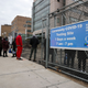 NEW YORK, USA - DECEMBER 28: Long line is seen at a Covid-19 testing center next to the Queens Hospital Center as hundreds of residents get Covid-19 test in Queens of New York, the United States, on December 28, 2021, as Omicron rises around the country.